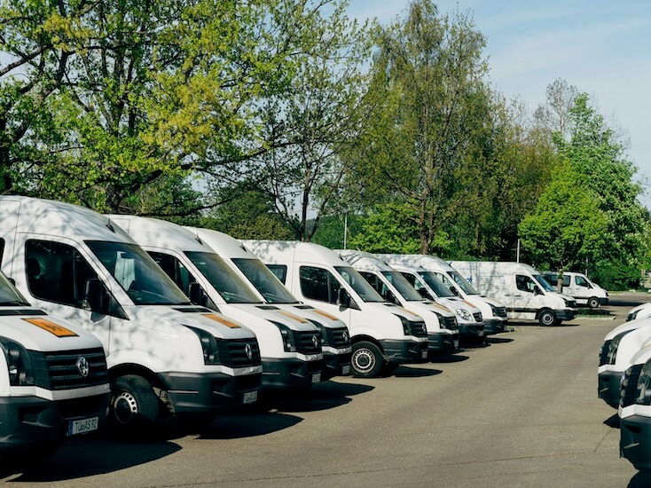cars parked on parking lot during daytime