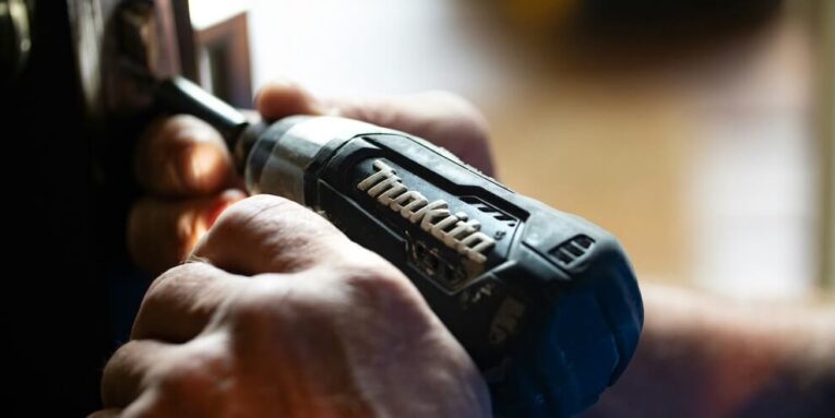 selective focus photography blue and black makita power drill FEATURED IMAGE