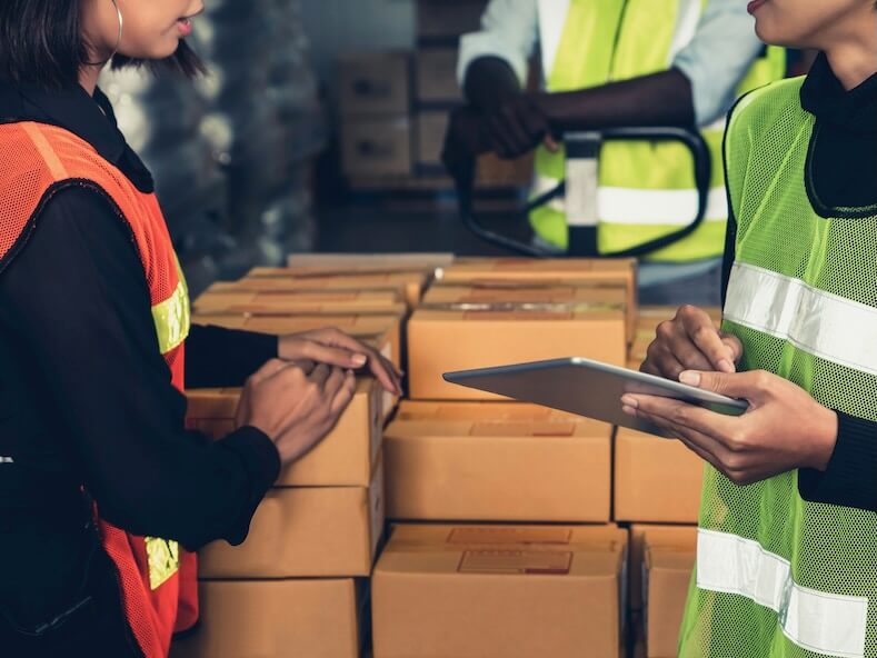 warehouse worker working together in the storehouse logistics supply chain and warehouse business concept