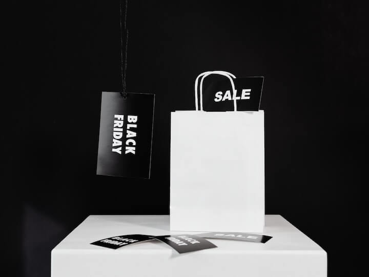 black friday tags and a white paperbag