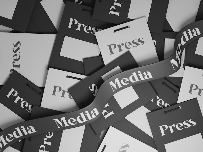 https://unsplash.com/photos/a-pile-of-black-and-white-papers-with-the-word-press-on-them-EfFbMImsR60