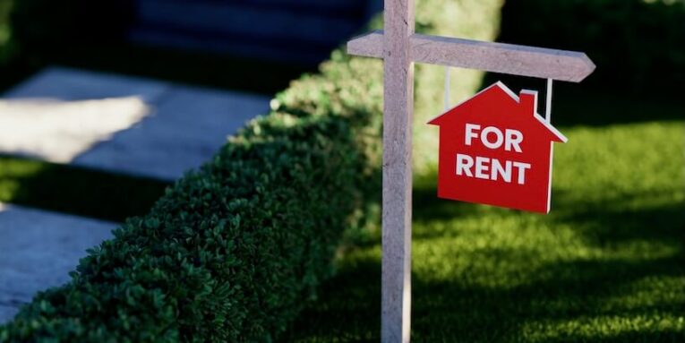 for rent sign in front of a house FEATURED IMAGE